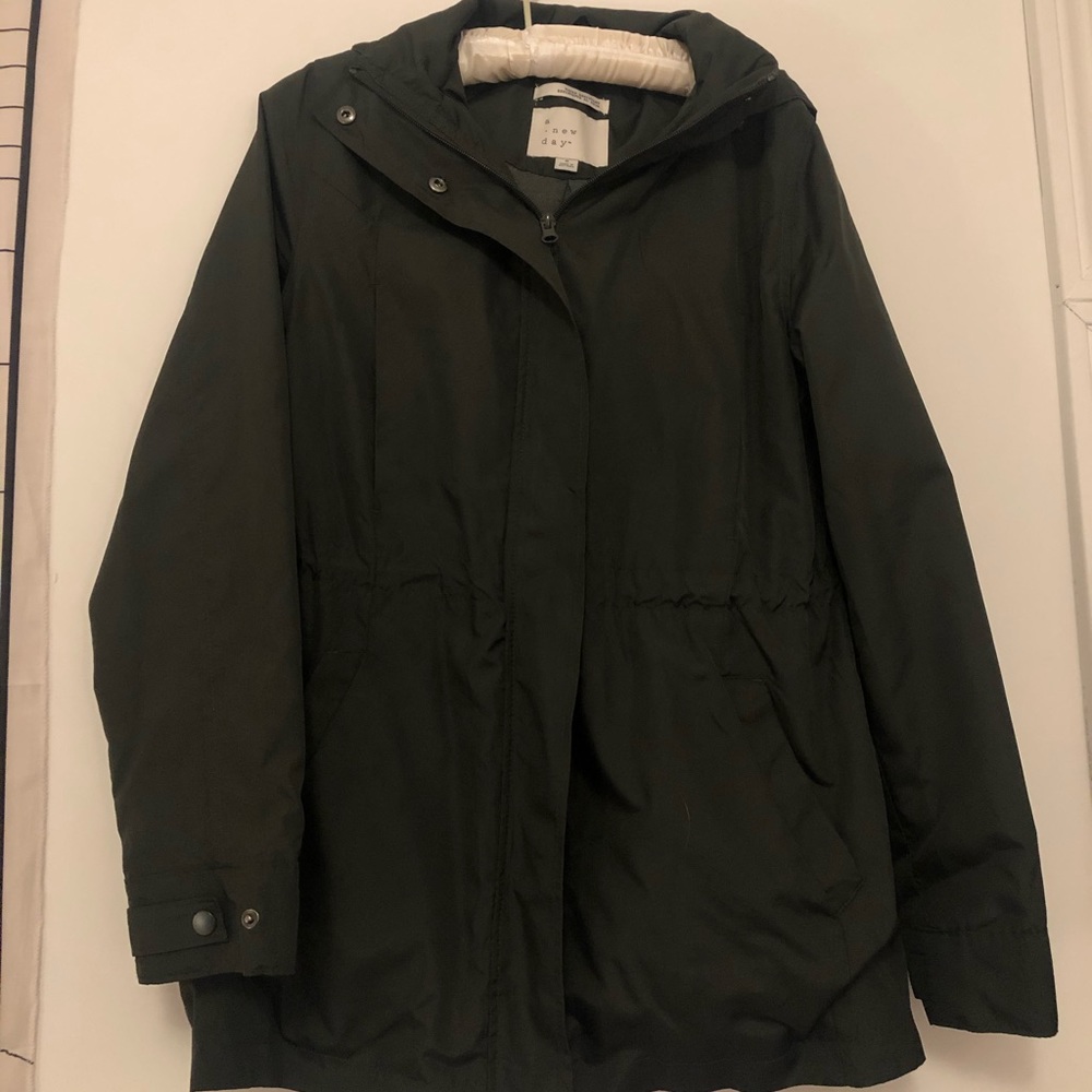 Green raincoat